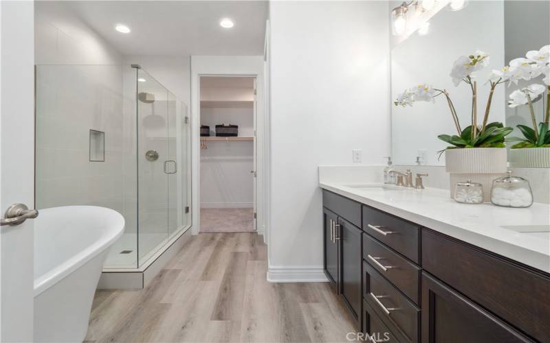Primary Bathroom. Photo is of staged home with same floorplan. Actual home will vary.