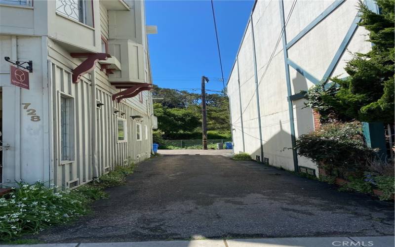 Alleyway to parking spot and private entrance