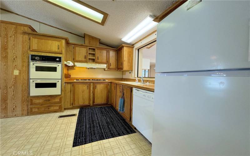 Includes Double Ovens, A Dishwasher & A Refrigerator