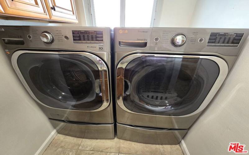 Large washer dryer combo unit.