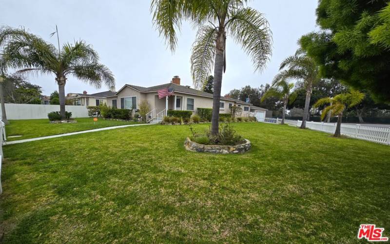 Huge gated front yard.