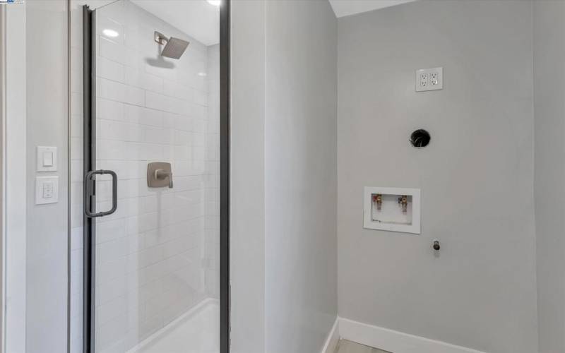Downstairs shower with Bluetooth speaker