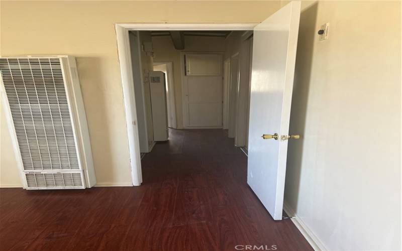 Hallway leads to bedrooms & bathroom