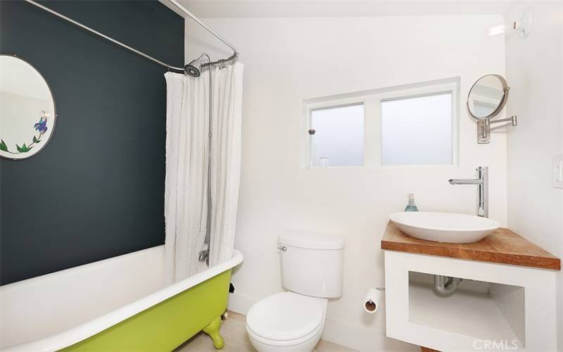 En suite bath upstairs with clawfoot tub