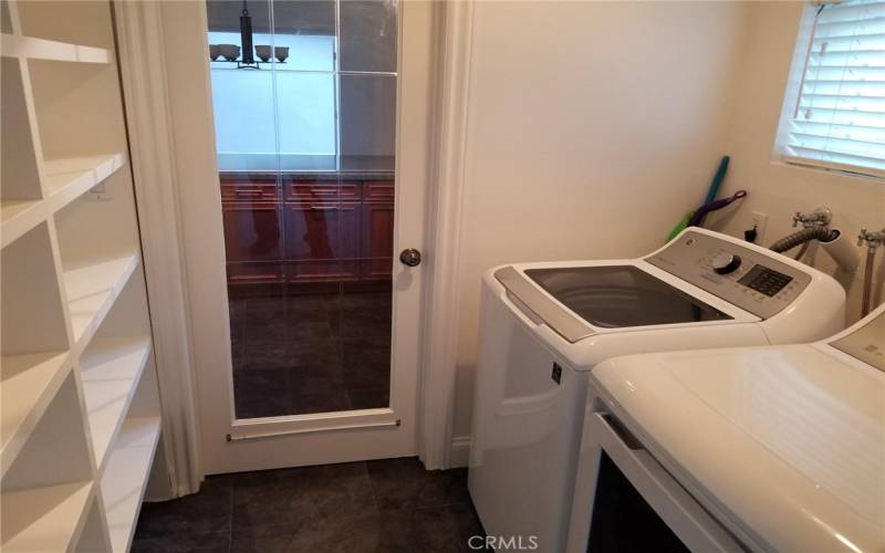Laundry room with lots of shelving space
