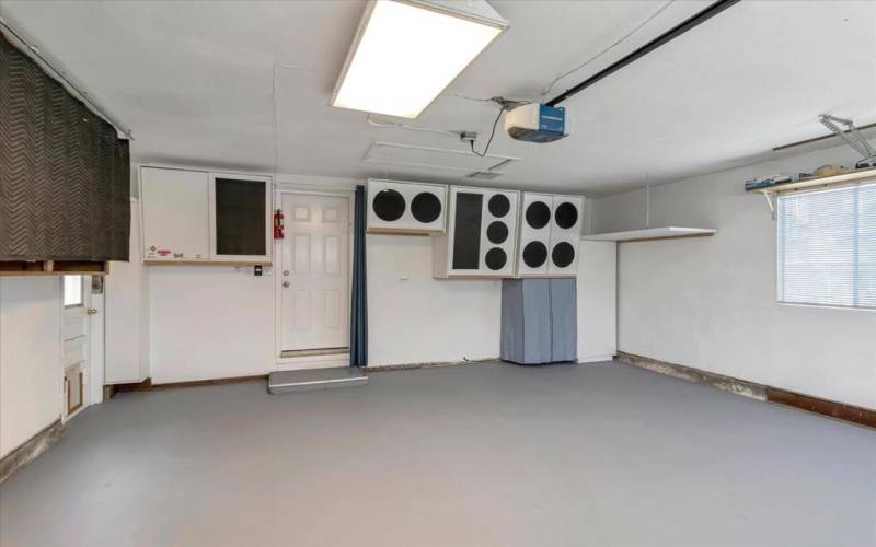 Spacious Attached Garage With Ample Storage.