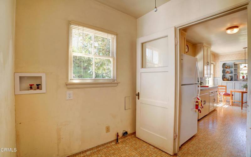 Large laundry room off kitchen