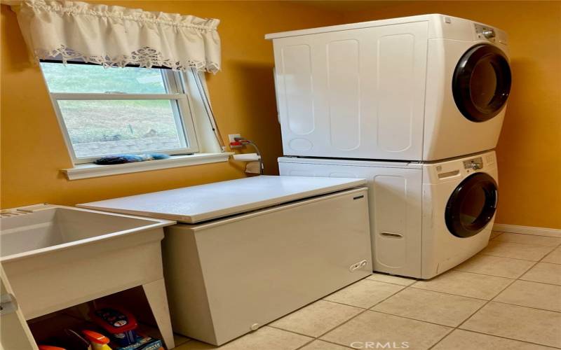 Laundry Room w Wash Basin and Freezer