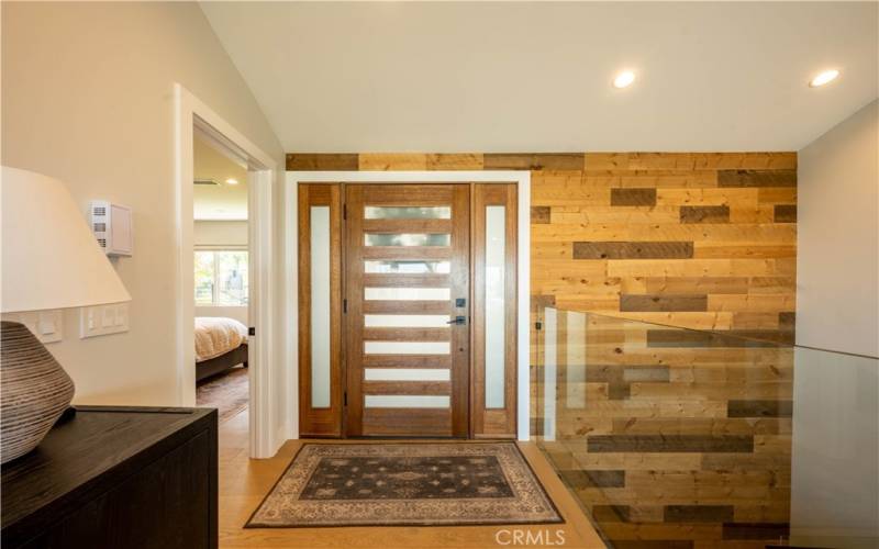 Entry way with reclaimed wood wall
