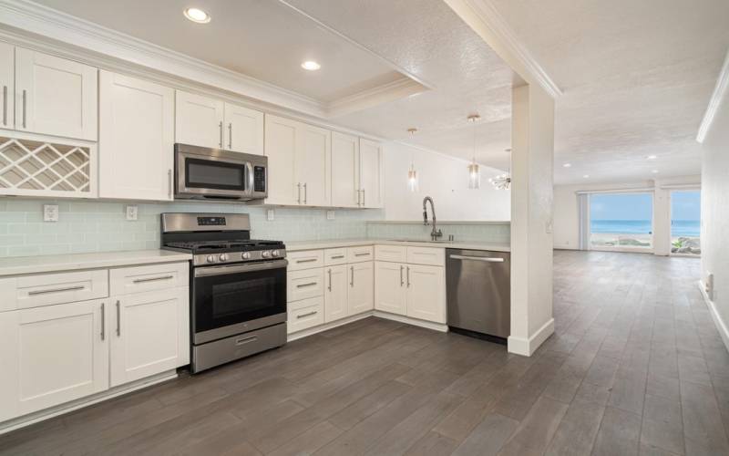 Enjoy ocean views while cooking and entertaining! Kitchen flows to dining and living areas.