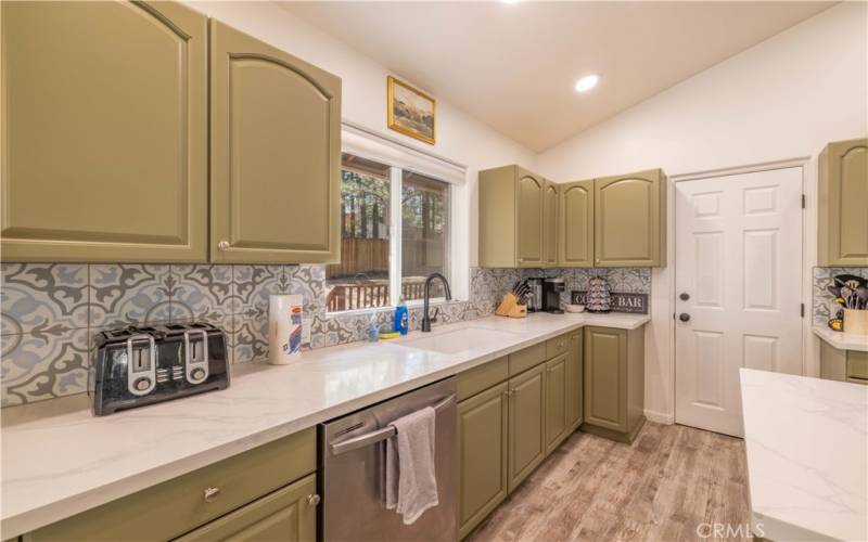 Large counter space and walk in pantry.