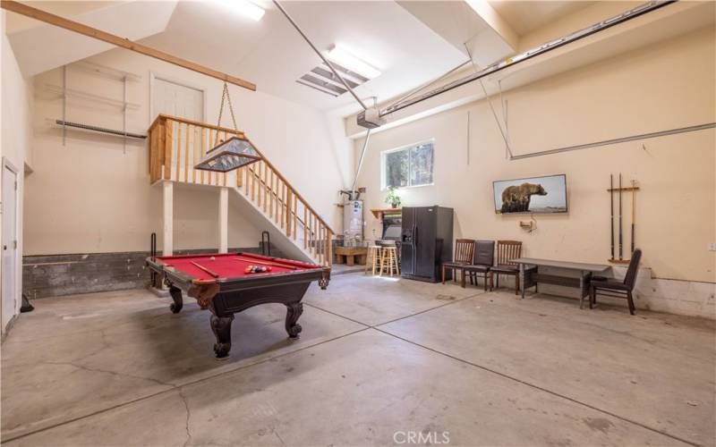 Large 2 car garage also doubles as the game room/ pool room.