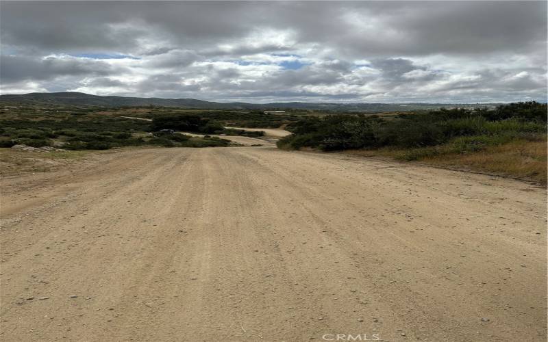 Road in front of parcel.