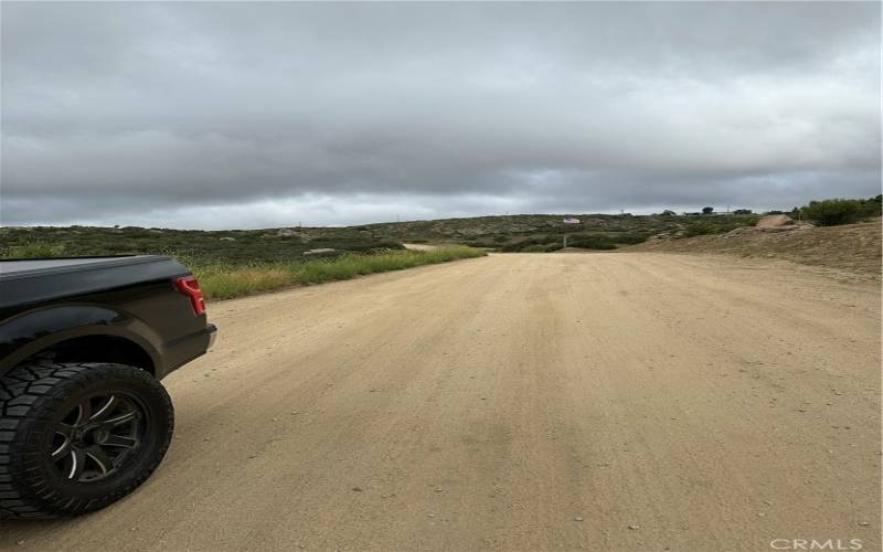 Road in front of parcel.