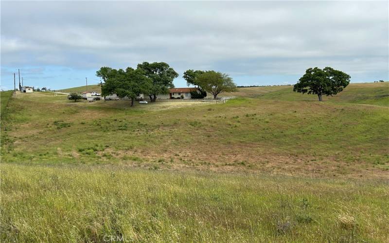 A distant view of the farm house.
