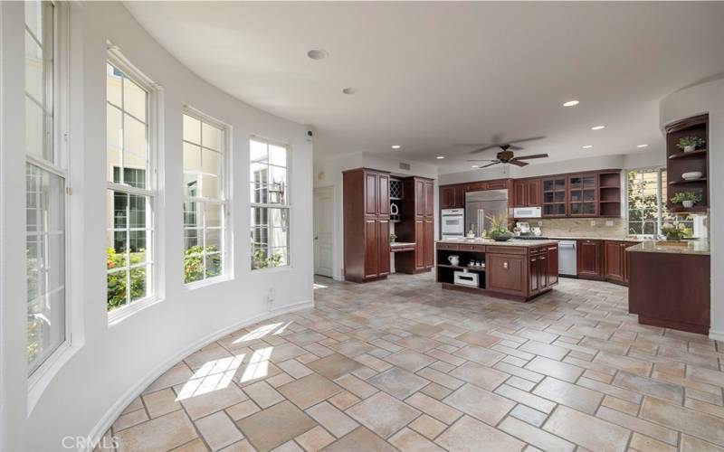 Huge great room leading from kitchen to breakfast nook and family room.