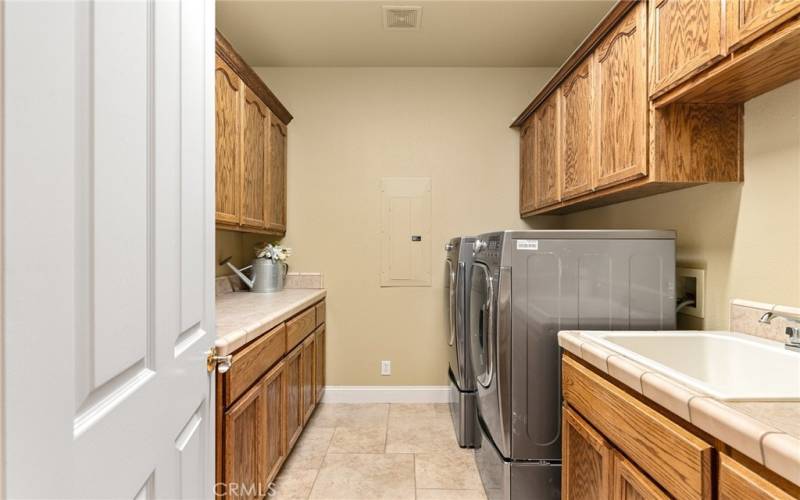 large laundry room with sink