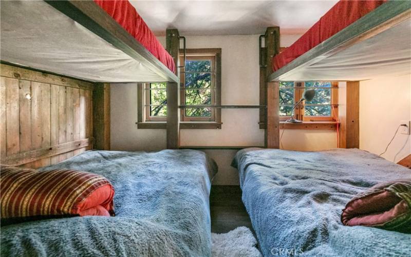 You can even sit up on the beds in these custom bunks
