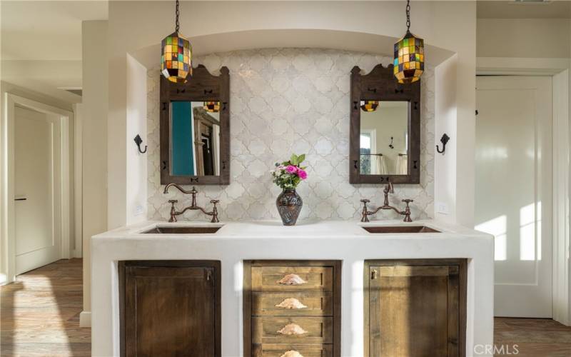 Primary vanity with dual hammered copper sinks