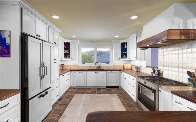 Virtually staged with cabinets painted white