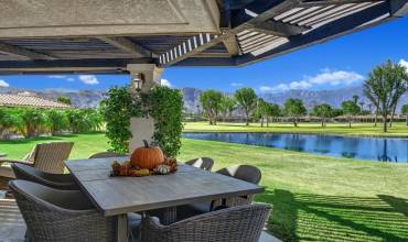 BACK COVERED DINING PATIO TO VIEW MLS