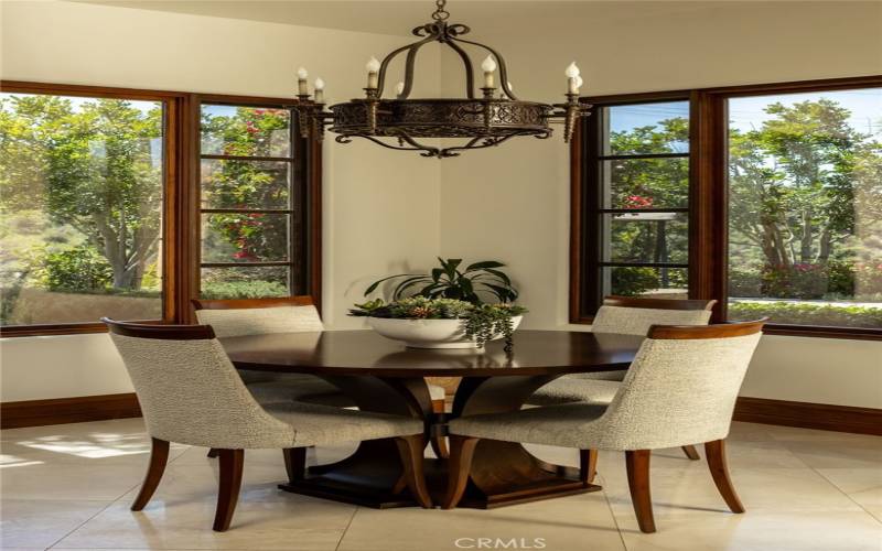 Informal Dining off kitchen surrounded by gorgeous windows, bringing the outdoors in