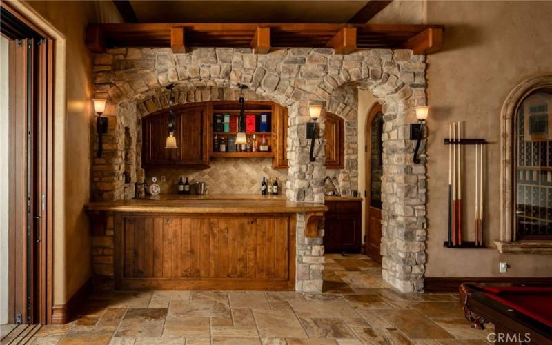 Bar area with walk-in wine cellar