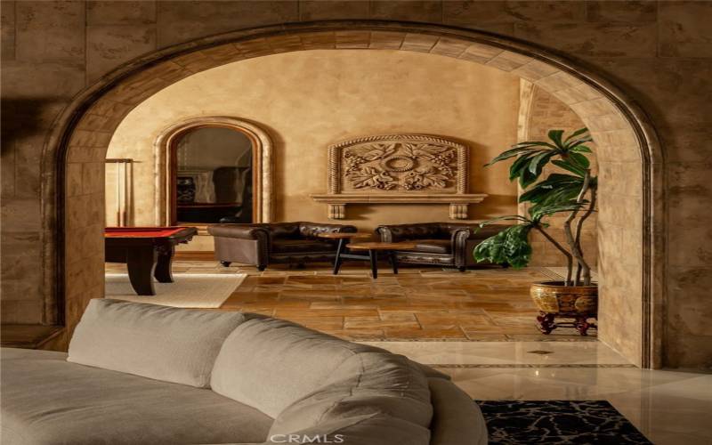 Arched stone doorways connect rooms