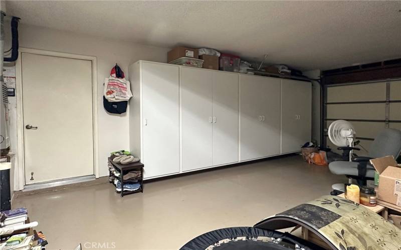 Storage Cabinets in garage with epoxy flooring