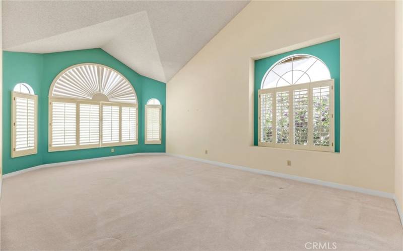 Formal Living Room - Bay Windows at Front of Home showing plantation shutters.