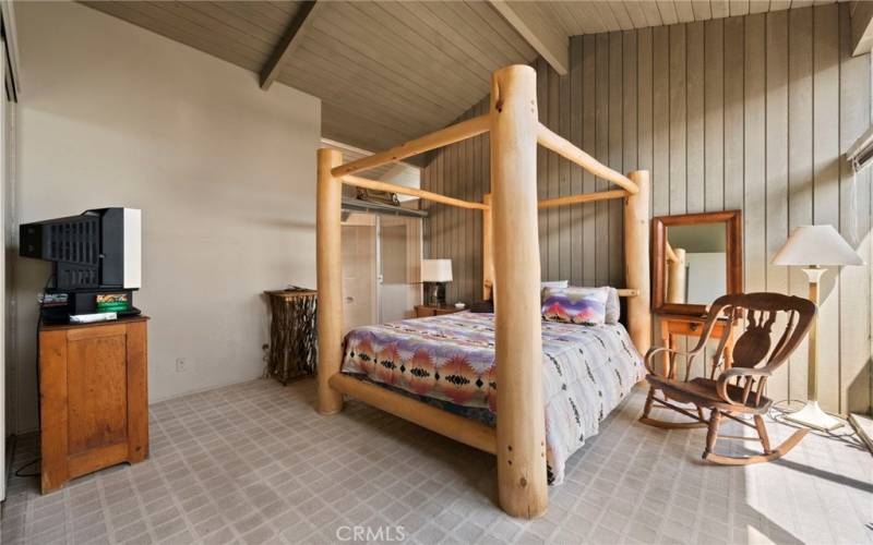Bedroom #2 high wooden ceilings with lots of natural light