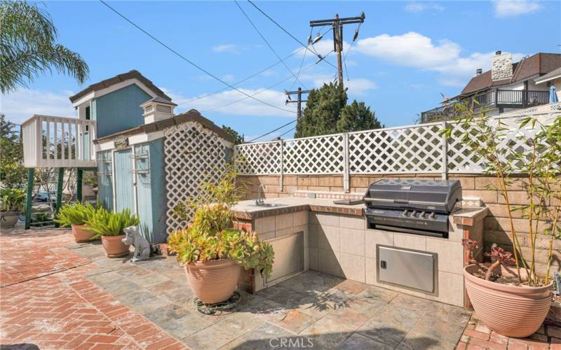 Backyard BBQ stand  and playhouse 2