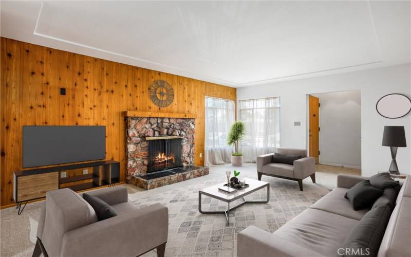 PINE WOOD AND A NATURAL STONE FIREPLACE MAKE THIS LIVING ROOM SO COZY!