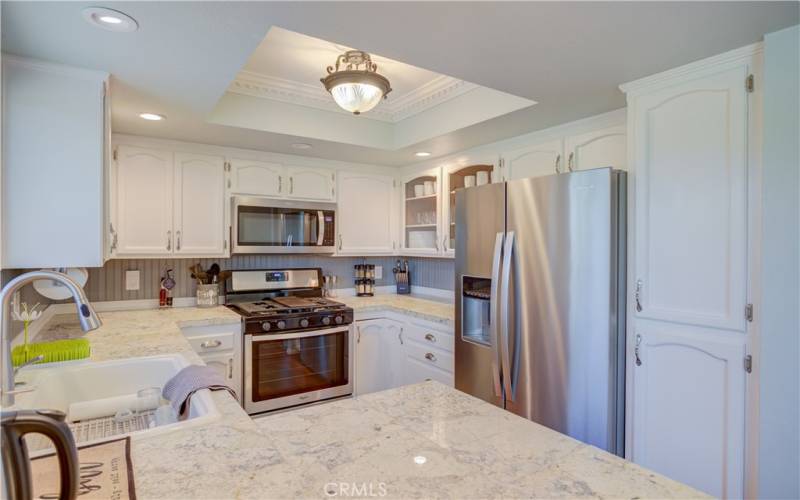 Well-appointed kitchen with new appliances.
