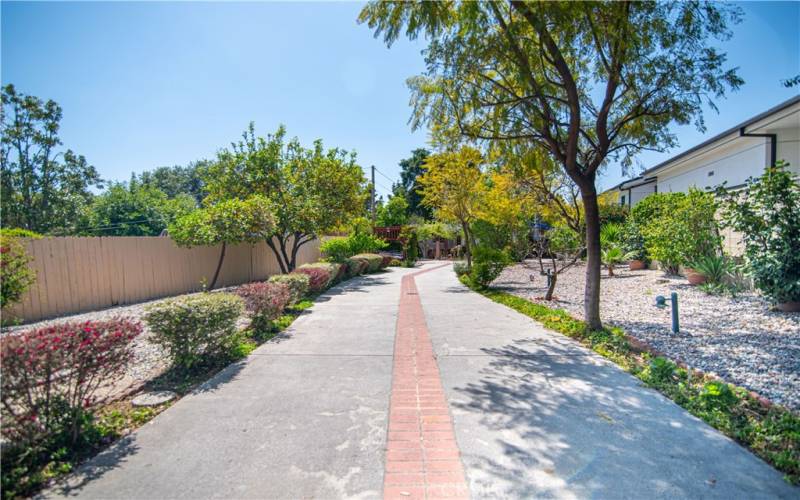 Private gated entrance and long driveway meticulously landscaped