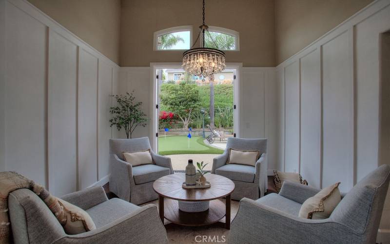 Enjoy gatherings in the Living Room with French Doors that lead out to the patio and Pool.