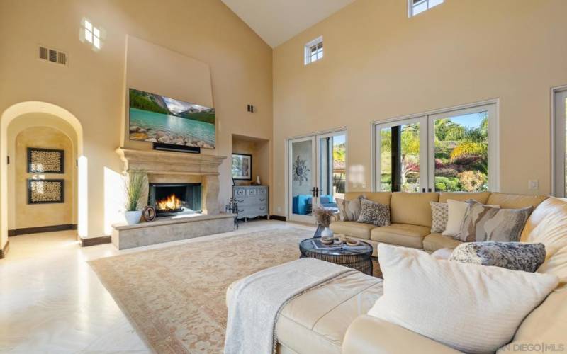 Family room with French doors to the interior courtyard and the backyard.