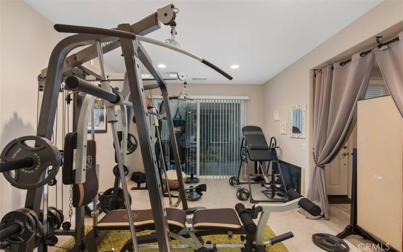 Formal dining area currently used as a private gym.