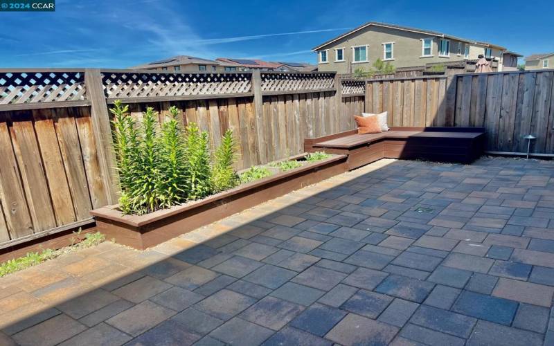 Don't need to do anything to this home. Custom Pavers, Gas hook up for BBQ, Outside lighting.