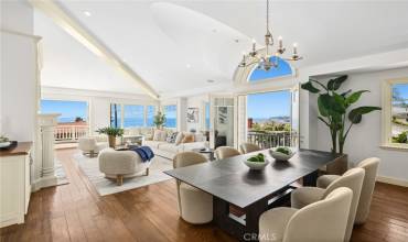 Panoramic ocean, whitewater, north-coast city-light, and Catalina sunset views fill almost every room of this luxurious Laguna Beach home with an enchanting ambiance that redefines the magic of indoor/outdoor living.