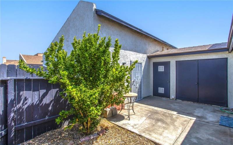 Cozy, private back patio leads to the 1 car private garage and the enclosed laundry room.  Washer & Dryer included in the sale.
