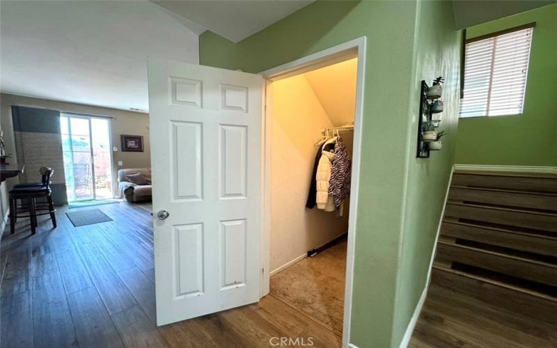 Guest closet with extra space.