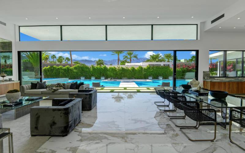 GREAT ROOM THROUGH TO POOL AND VIEW