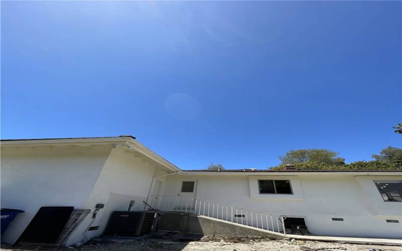 Back of house leading to garage