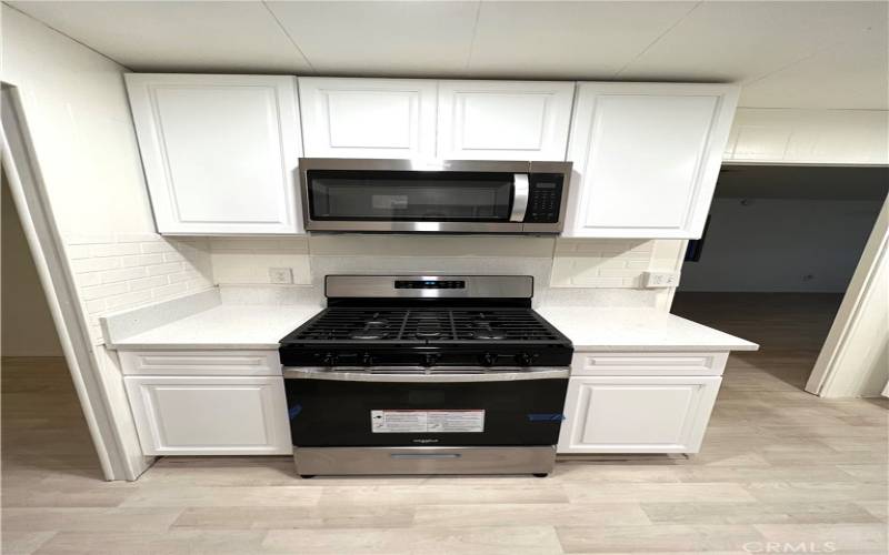 Kitchen angle 4 showing new cabinets & appliances