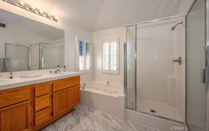 This is the main bathroom and a Saugus California home for sale you can see the customer and custom shutters on the window