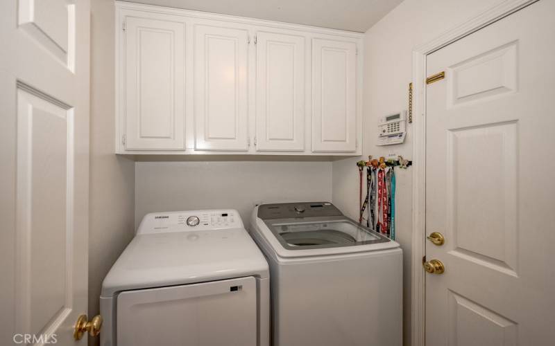 Simple, yet very functional laundry room with direct garage access