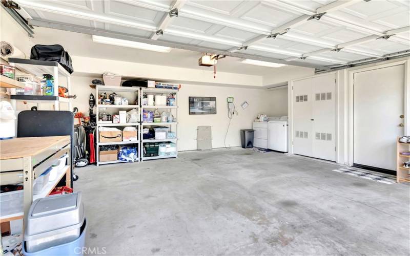 Garage will accommodate 2 cars, side by side. Washer & dryer located here along with the new water heater that is behind the double doors next to them. This also houses the forced air heating unit. Next to that area is the garage entry door into the foyer.