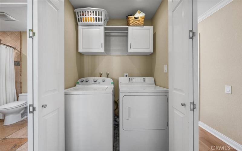 Laundry room, washer, and dryer included