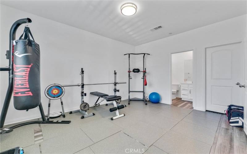 Downstairs bedroom with private bath - current used as a Workout room.